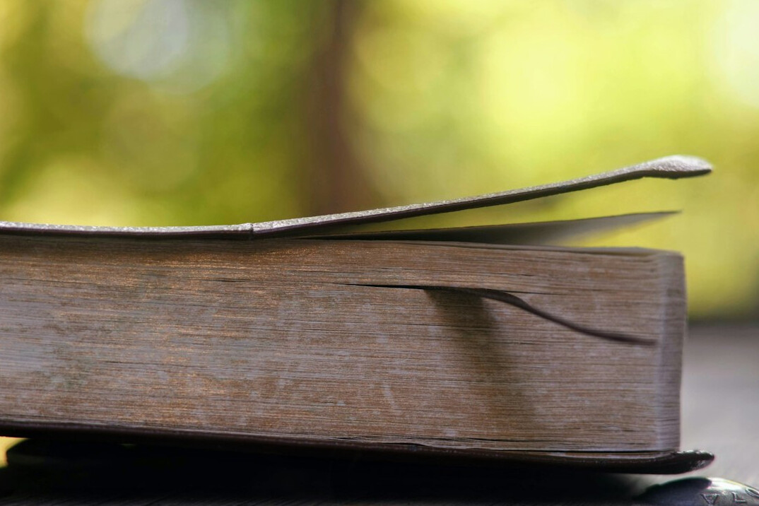open mystery book with question mark