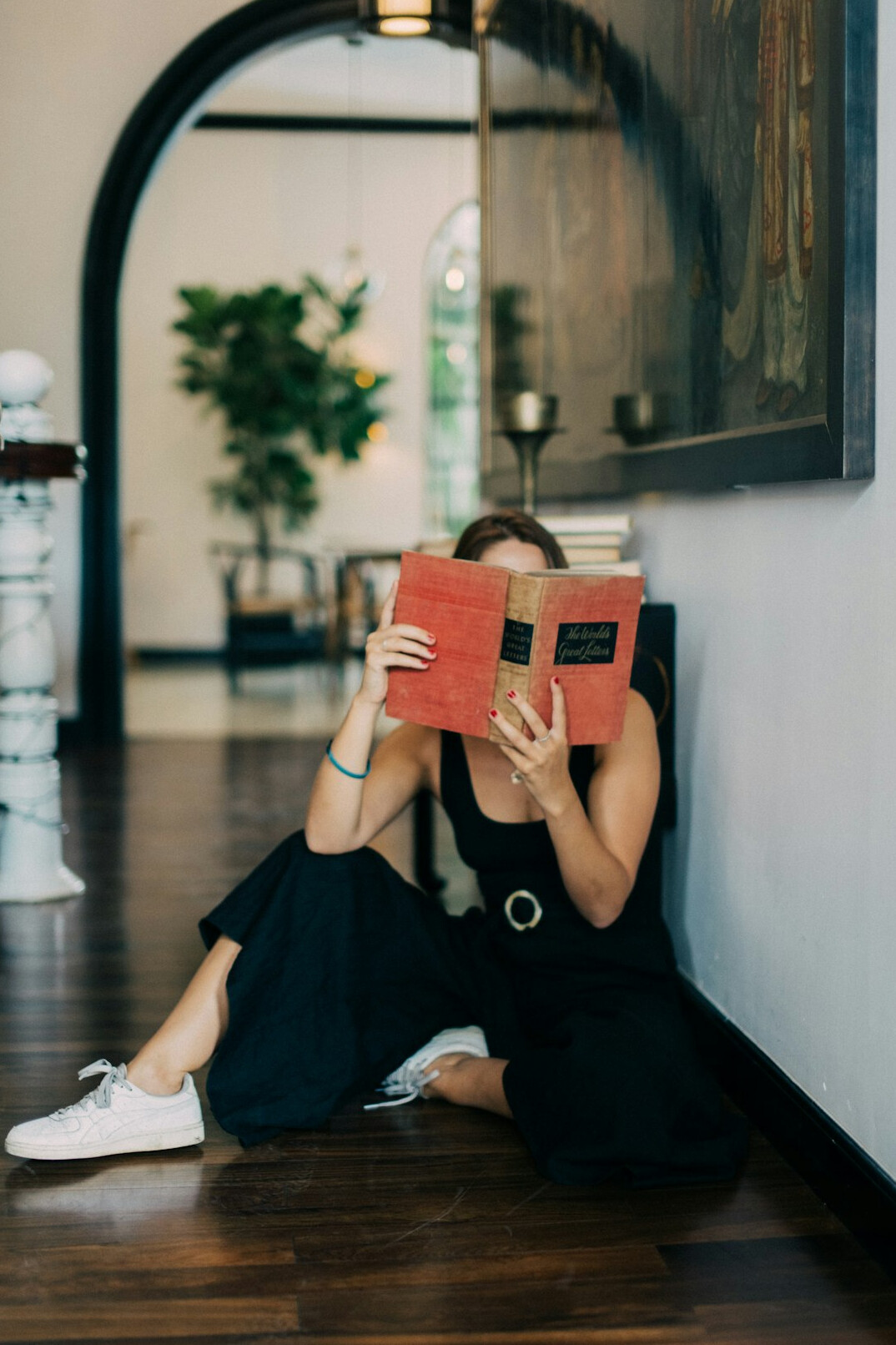 anxious reader with book